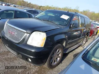 2011 GMC Yukon XL Denali with VIN 1GKS1MEF7BR271098, listed as a IAAI auction lot 42064073 with 218,601 mi miles. Bid and sale history available at carsss.com. Image 2.