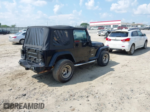 2002 Jeep Wrangler Sport with VIN 1J4FA49S32P700831, listed as a IAAI auction lot 42626269 with 182,870 mi miles and . Bid and sale history available at DreamBid. Image 4.