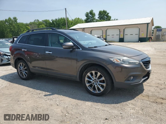 2015 Mazda CX-9 Grand Touring with VIN JM3TB2DA9F0468539, listed as a Copart auction lot 60829905 with 223,483 mi miles and Clean title. Bid and sale history available at DreamBid. Image 4.