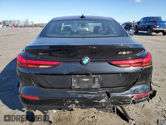 2021 BMW 2 Series 228i xDrive with VIN WBA73AK09M7H17065, listed as a Copart auction lot 83199304 with 42,710 mi miles and Salvage title. Bid and sale history available at DreamBid. Image 6.