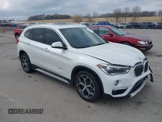 2016 BMW X1 xDrive28i with VIN WBXHT3C35GP886144, listed as a IAAI auction lot 41954742 with 89,268 mi miles. Bid and sale history available at carsss.com. Image 1.