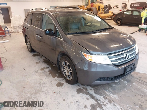 2012 Honda Odyssey EX-L with VIN 5FNRL5H66CB127507, listed as a IAAI auction lot 41961465 with 228,972 mi miles and . Bid and sale history available at carsss.com. Image 1.