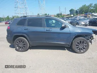 2021 Jeep Cherokee Latitude Lux z VIN 1C4PJMMX8MD205199, wystawiony jako IAAI lot #42556584 z przebiegiem 32 787 mil mil oraz . Historia ofert i sprzedaży dostępna na DreamBid. Obrazek 14.