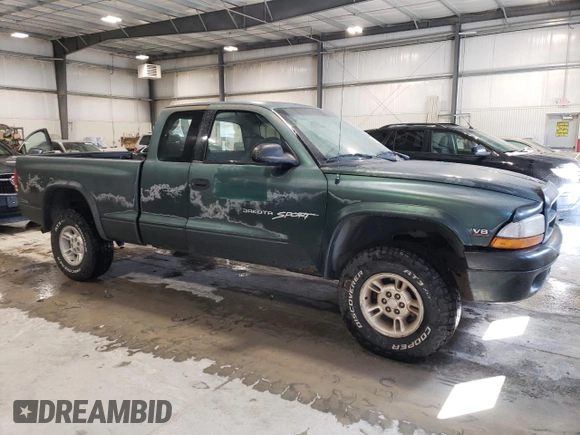 1999 Dodge Dakota SLT with VIN 1B7GG22Y9XS149398, listed as a Copart auction lot 47950025 with 173,413 mi miles and Salvage Title. Bid and sale history available at carsss.com. Image 4.