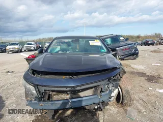 2014 Chevrolet Impala LT with VIN 2G1125S34E9182682, listed as a IAAI auction lot 42039580 with 127,629 mi miles and . Bid and sale history available at DreamBid. Image 12.