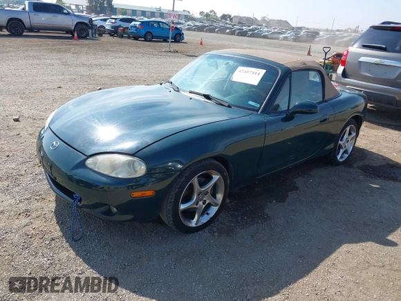 2001 Mazda MX-5 Miata z VIN JM1NB353110214307, wystawiony jako IAAI lot #42407414 z przebiegiem 158 400 mil mil oraz . Historia ofert i sprzedaży dostępna na DreamBid. Obrazek 2.