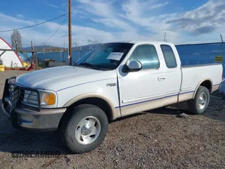 1997 Ford F-150 XL with VIN 1FTDX18W2VNB49600, listed as a IAAI auction lot 40811819 with 252,726 mi miles and . Bid and sale history available at DreamBid. Image 2.