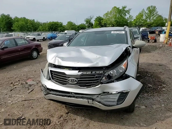 2012 Kia Sportage LX z VIN KNDPB3A29C7264856, wystawiony jako Copart lot #58397685 z przebiegiem 144 621 mil mil oraz Szkoda całkowita • Salvage title. Historia ofert i sprzedaży dostępna na DreamBid. Obrazek 14.