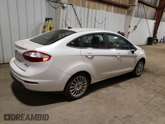 2016 Ford Fiesta Titanium z VIN 3FADP4CJ0GM167738, wystawiony jako Copart lot #57875245 z przebiegiem 159 230 mil mil oraz Czysty tytuł • Clean title. Historia ofert i sprzedaży dostępna na DreamBid. Obrazek 3.