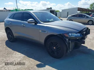2020 Jaguar F-Pace 25t Prestige z VIN SADCK2FX8LA631153, wystawiony jako IAAI lot #42591874 z przebiegiem 67 438 mil mil oraz . Historia ofert i sprzedaży dostępna na DreamBid. Obrazek 1.