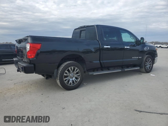 2016 Nissan Titan XD PRO-4X with VIN 1N6BA1F4XGN508153, listed as a Copart auction lot 83017424 with 152,709 mi miles and Clean Title. Bid and sale history available at carsss.com. Image 3.