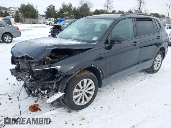 2020 Volkswagen Tiguan S with VIN 3VV0B7AXXLM080652, listed as a IAAI auction lot 41379678 with 46,330 mi miles and . Bid and sale history available at DreamBid. Image 2.