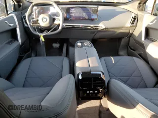 2025 BMW iX xDrive50 with VIN WB523CF01SCT04234, listed as a Copart auction lot 43649065 with 2,189 mi miles and Salvage Title. Bid and sale history available at carsss.com. Image 8.