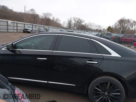 2014 Cadillac XTS Platinum with VIN 2G61W5S84E9291640, listed as a IAAI auction lot 41877867 with 100,462 mi miles and . Bid and sale history available at DreamBid. Image 14.