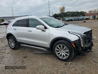 2021 Cadillac XT4 FWD Premium Luxury with VIN 1GYFZCR48MF083164, listed as a Copart auction lot 55377235 with 63,987 mi miles and Salvage title. Bid and sale history available at DreamBid. Image 4.