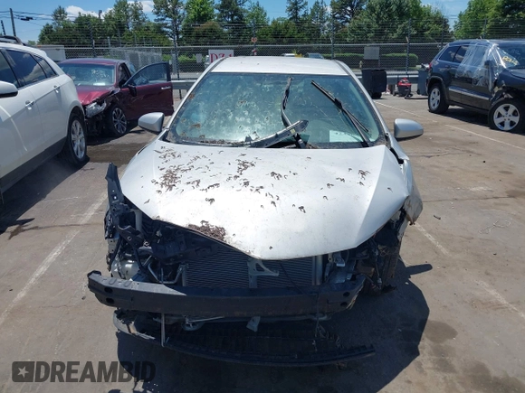 2014 Toyota Corolla L with VIN 2T1BURHE6EC201402, listed as a IAAI auction lot 42350827 with 100,704 mi miles and . Bid and sale history available at DreamBid. Image 12.