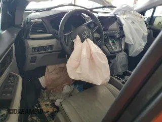 2023 Honda Odyssey Elite with VIN 5FNRL6H98PB056770, listed as a Copart auction lot 56984055 with Not provided miles and Salvage title. Bid and sale history available at DreamBid. Image 8.