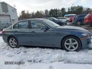 2015 BMW 3 Series 328i xDrive with VIN WBA3B5G55FNS14903, listed as a IAAI auction lot 41497975 with 62,009 mi miles. Bid and sale history available at carsss.com. Image 13.