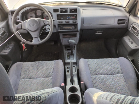 2000 Toyota RAV4 с VIN JT3HP10V4Y7161880, выставлен на аукционе Copart как лот 66219245 с пробегом 226 753 миль миль и Чистый • Clean title. История ставок и продаж доступна на DreamBid. Изображение 8.