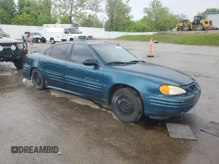 2002 Pontiac Grand Am SE z VIN 1G2NE52F92C172605, wystawiony jako Copart lot #56541555 z przebiegiem 164 600 mil mil oraz Szkoda całkowita • Salvage title. Historia ofert i sprzedaży dostępna na DreamBid. Obrazek 4.