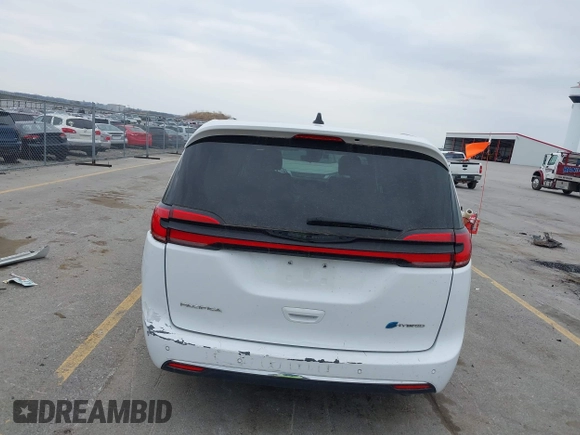 2023 Chrysler Pacifica Hybrid Touring L z VIN 2C4RC1L74PR540870, wystawiony jako IAAI lot #42056528 z przebiegiem 46 940 mil mil oraz . Historia ofert i sprzedaży dostępna na DreamBid. Obrazek 19.