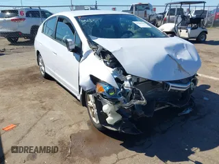 2010 Honda Insight EX with VIN JHMZE2H79AS039292, listed as a IAAI auction lot 41880303 with Not Provided miles and . Bid and sale history available at DreamBid. Image 1.