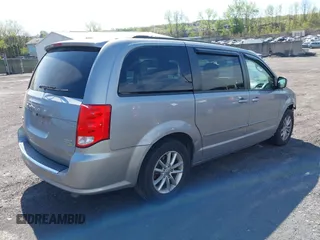 2015 Dodge Grand Caravan SXT with VIN 2C4RDGCG2FR540431, listed as a IAAI auction lot 42133044 with 245,977 mi miles and . Bid and sale history available at DreamBid. Image 4.