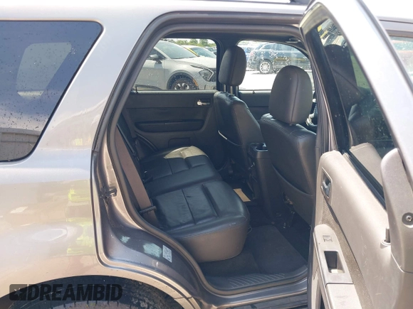 2010 Ford Escape Limited z VIN 1FMCU9EG5AKC61203, wystawiony jako IAAI lot #42334919 z przebiegiem 184 243 mil mil oraz . Historia ofert i sprzedaży dostępna na DreamBid. Obrazek 8.