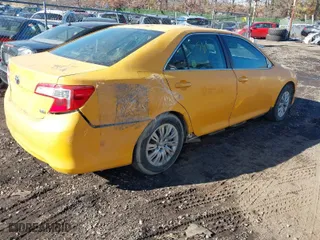 2012 Toyota Camry Hybrid XLE with VIN 4T1BD1FK1CU056792, listed as a IAAI auction lot 41436850 with 999,999 mi miles. Bid and sale history available at carsss.com. Image 4.