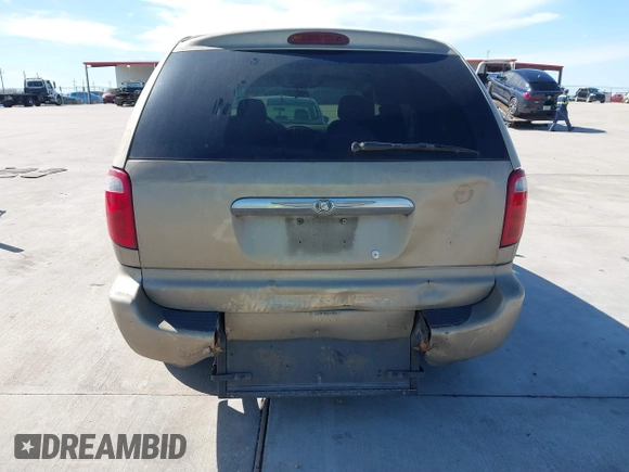 2003 Chrysler Town & Country LX with VIN 2C4GP44L73R103612, listed as a IAAI auction lot 41680848 with 211,360 mi miles and . Bid and sale history available at DreamBid. Image 6.