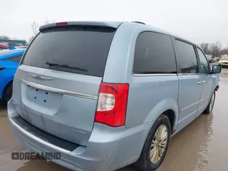 2013 Chrysler Town & Country Limited with VIN 2C4RC1GG0DR566307, listed as a IAAI auction lot 41941616 with 192,378 mi miles. Bid and sale history available at carsss.com. Image 4.