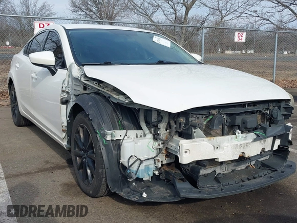 2014 Mazda 6 i Sport with VIN JM1GJ1U67E1159003, listed as a IAAI auction lot 41710750 with 200,522 mi miles. Bid and sale history available at carsss.com. Image 1.