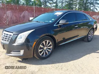 2013 Cadillac XTS Premium z VIN 2G61S5S34D9127996, wystawiony jako IAAI lot #41978539 z przebiegiem 185 157 mil mil oraz . Historia ofert i sprzedaży dostępna na DreamBid. Obrazek 2.