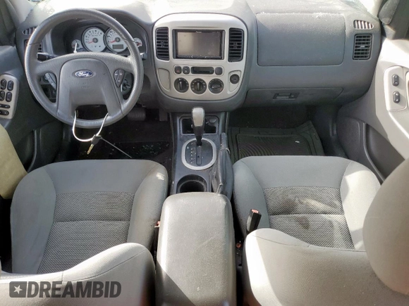 2006 Ford Escape XLT with VIN 1FMYU03136KD25536, listed as a Copart auction lot 56892805 with 187,216 mi miles and Salvage title. Bid and sale history available at DreamBid. Image 8.
