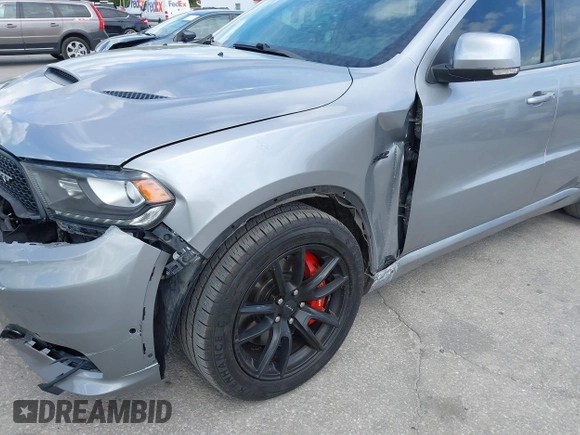 2018 Dodge Durango SRT with VIN 1C4SDJGJ6JC366644, listed as a IAAI auction lot 41906182 with 54,490 mi miles and . Bid and sale history available at DreamBid. Image 6.