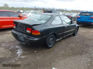 1997 Honda Civic EX with VIN 1HGEJ8242VL044722, listed as a IAAI auction lot 42045941 with 266,481 mi miles. Bid and sale history available at carsss.com. Image 4.