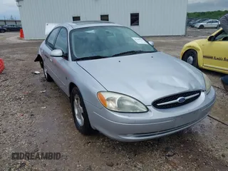 2003 Ford Taurus SES Standard z VIN 1FAFP55S43G270637, wystawiony jako IAAI lot #42205556 z przebiegiem 171 286 mil mil oraz . Historia ofert i sprzedaży dostępna na DreamBid. Obrazek 1.