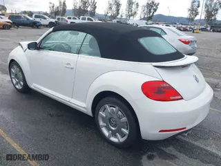2013 Volkswagen Beetle Convertible 2.5L with VIN 3VW5P7AT9DM825439, listed as a IAAI auction lot 41760907 with 53,649 mi miles. Bid and sale history available at carsss.com. Image 3.