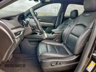 2020 Cadillac XT4 FWD Premium Luxury with VIN 1GYFZCR40LF073517, listed as a Copart auction lot 60121635 with 79,450 mi miles and Salvage title. Bid and sale history available at DreamBid. Image 7.