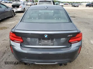 2018 BMW M2 z VIN WBS1J5C58J7B61965, wystawiony jako Copart lot #63543004 z przebiegiem 9 663 mil mil oraz Szkoda całkowita • Salvage title. Historia ofert i sprzedaży dostępna na DreamBid. Obrazek 6.