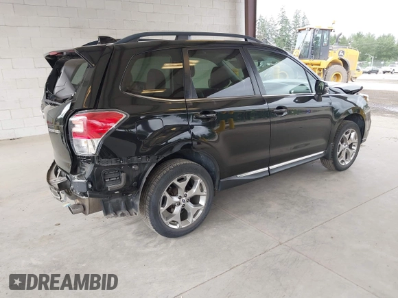2018 Subaru Forester Touring with VIN JF2SJAWC2JH598982, listed as a IAAI auction lot 42455652 with 57,254 mi miles and . Bid and sale history available at DreamBid. Image 4.