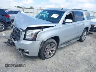 2015 GMC Yukon SLT z VIN 1GKS2BKC0FR100064, wystawiony jako IAAI lot #41941462 z przebiegiem 136 740 mil mil oraz . Historia ofert i sprzedaży dostępna na DreamBid. Obrazek 2.
