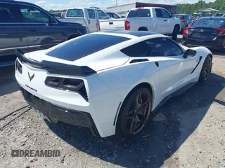 2014 Chevrolet Corvette Z51 3LT z VIN 1G1YM2D71E5116935, wystawiony jako IAAI lot #42341161 z przebiegiem 105 686 mil mil oraz . Historia ofert i sprzedaży dostępna na DreamBid. Obrazek 4.