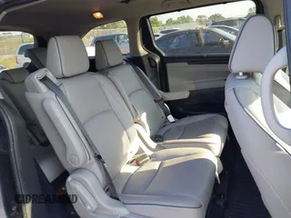2023 Honda Odyssey Elite z VIN 5FNRL6H98PB017788, wystawiony jako IAAI lot #42312586 z przebiegiem 16 208 mil mil oraz . Historia ofert i sprzedaży dostępna na DreamBid. Obrazek 8.