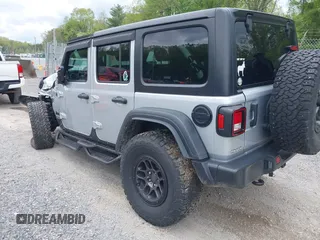 2023 Jeep Wrangler Sport S с VIN 1C4HJXDN0PW511682, выставлен на аукционе IAAI как лот 42199890 с пробегом 29 061 миль миль и . История ставок и продаж доступна на DreamBid. Изображение 3.
