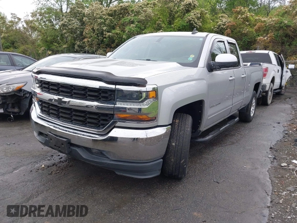 2018 Chevrolet Silverado 1500 LT with VIN 1GCVKREC7JZ151678, listed as a IAAI auction lot 41972011 with 106,892 mi miles and . Bid and sale history available at DreamBid. Image 17.