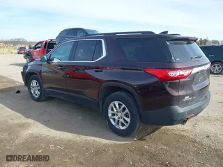2020 Chevrolet Traverse LT Cloth with VIN 1GNEVGKWXLJ151077, listed as a IAAI auction lot 41520534 with 76,473 mi miles. Bid and sale history available at carsss.com. Image 3.