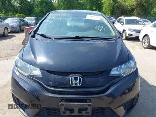2015 Honda Fit LX z VIN 3HGGK5H51FM724566, wystawiony jako IAAI lot #42151755 z przebiegiem 168 744 mil mil oraz . Historia ofert i sprzedaży dostępna na DreamBid. Obrazek 12.