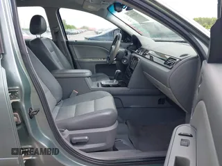 2006 Mercury Montego Luxury z VIN 1MEFM40106G609778, wystawiony jako IAAI lot #42212020 z przebiegiem Nie podano mil oraz . Historia ofert i sprzedaży dostępna na DreamBid. Obrazek 5.