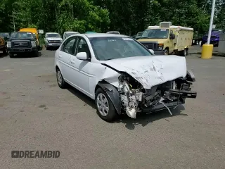 2011 Hyundai Accent GLS z VIN KMHCN4AC0BU603293, wystawiony jako Copart lot #58780435 z przebiegiem 55 222 mil mil oraz Szkoda całkowita • Salvage title. Historia ofert i sprzedaży dostępna na DreamBid. Obrazek 13.